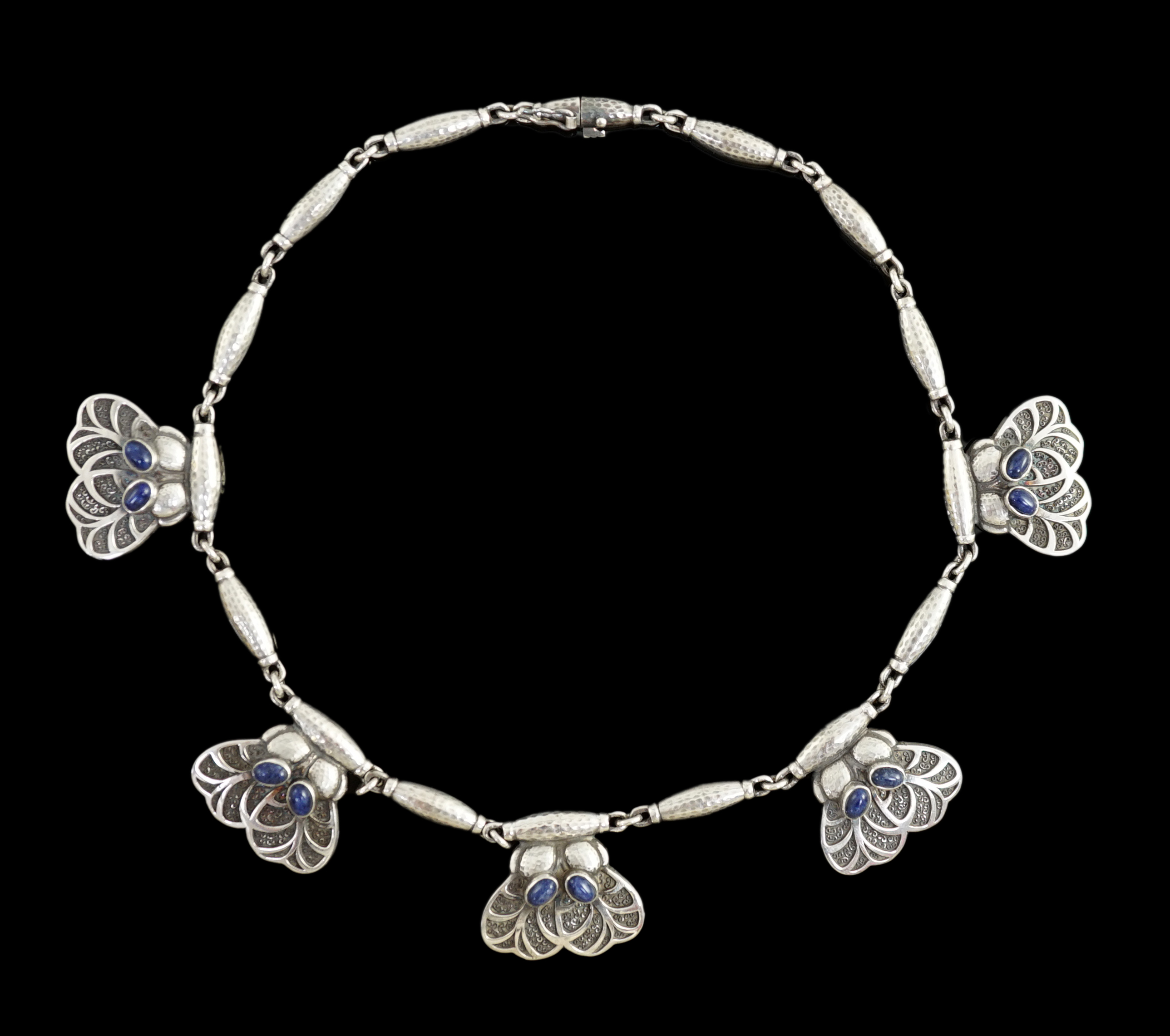 A Georg Jensen planished sterling silver and cabochon blue quartz set necklace, design no. 4